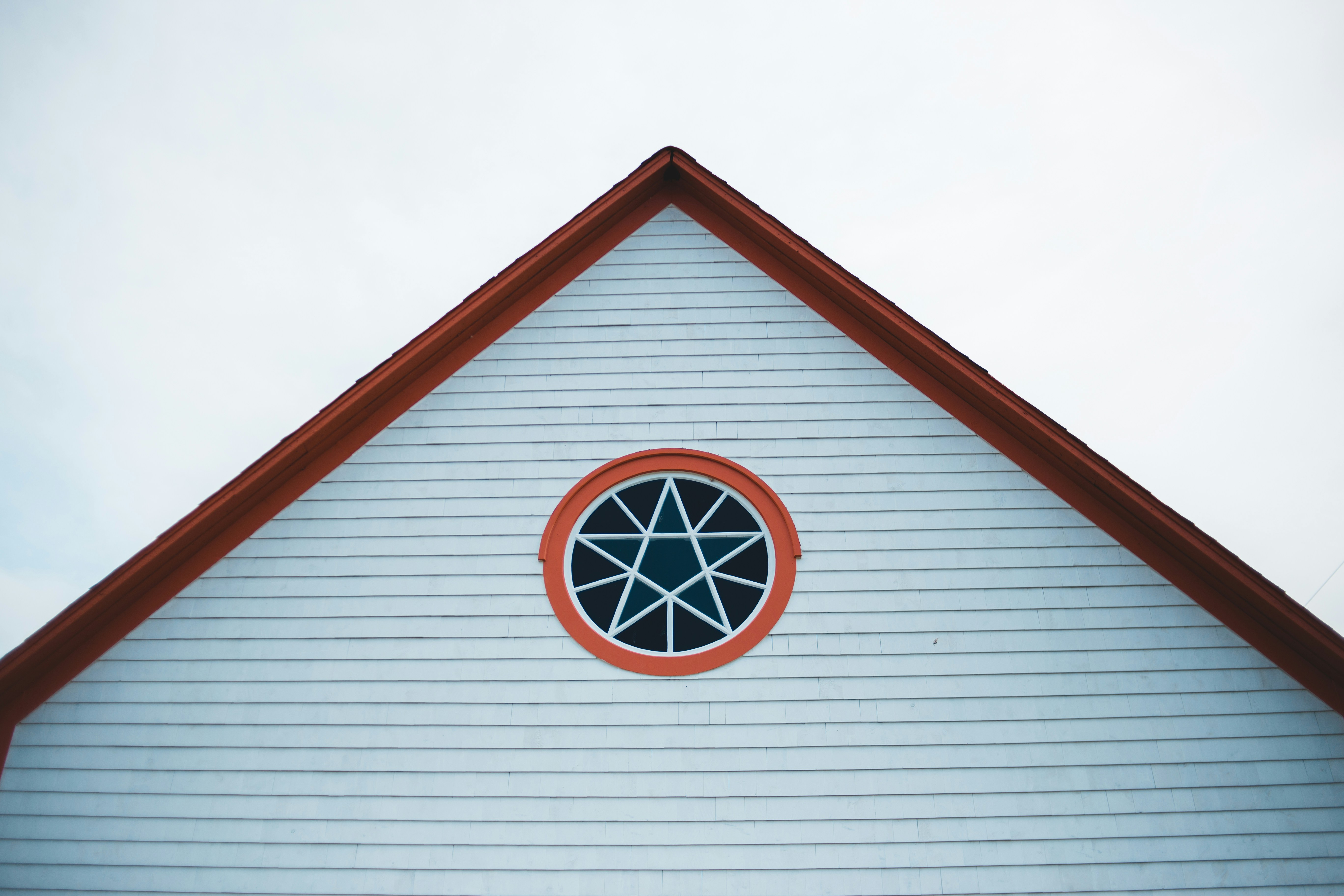 white and red wooden house