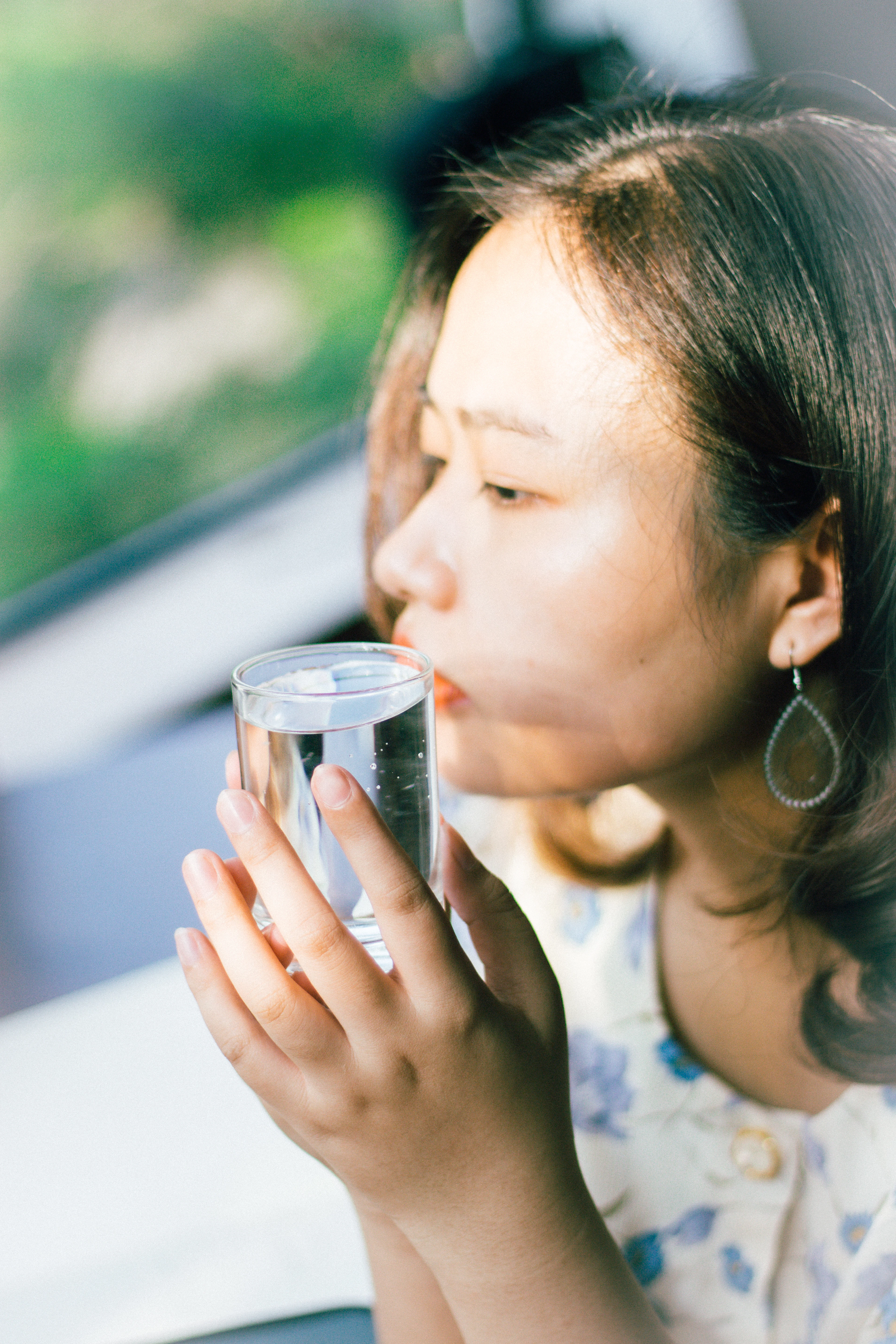 Woman enjoying a glass of fresh water