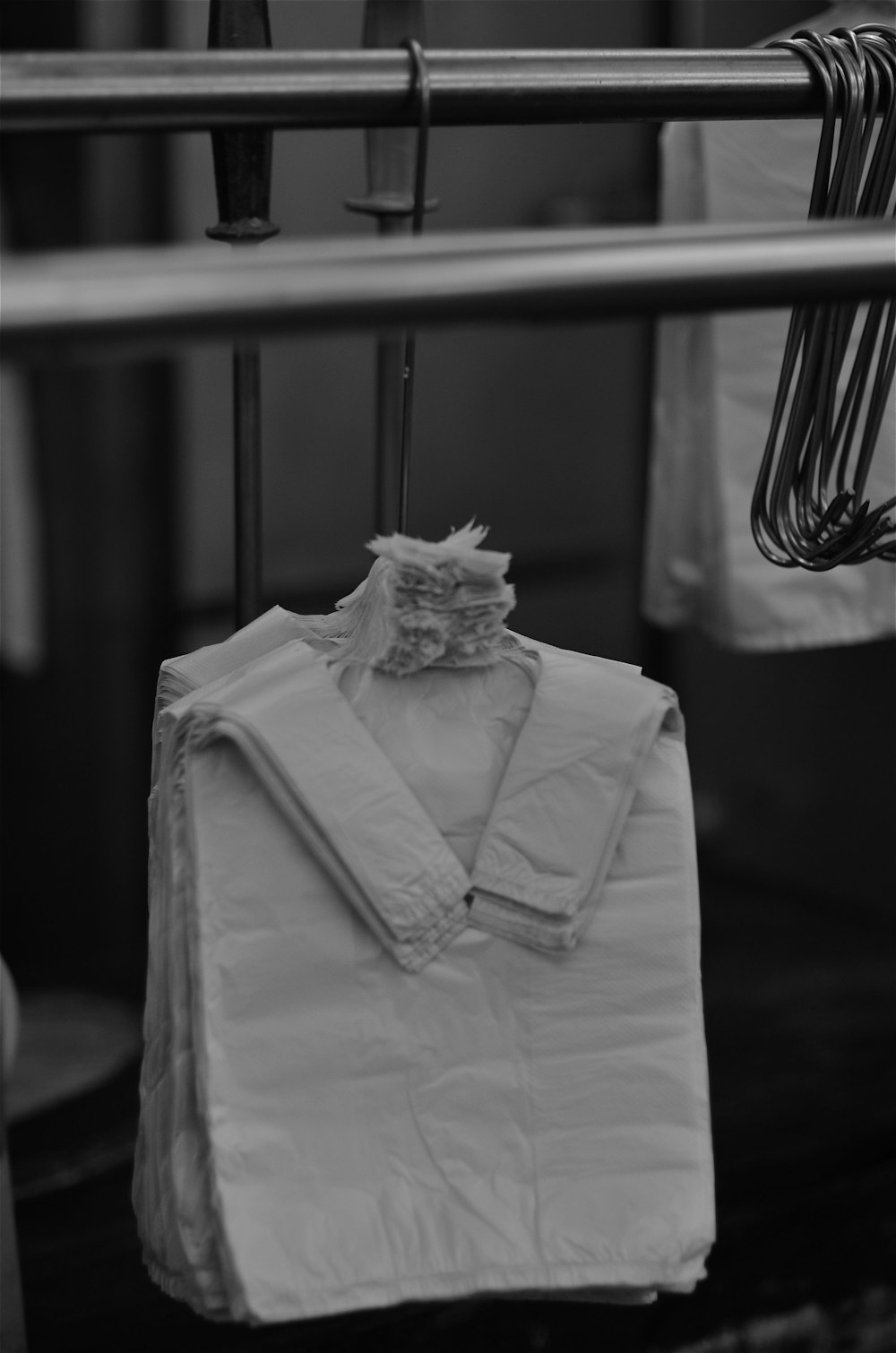 grayscale photo of dress shirt