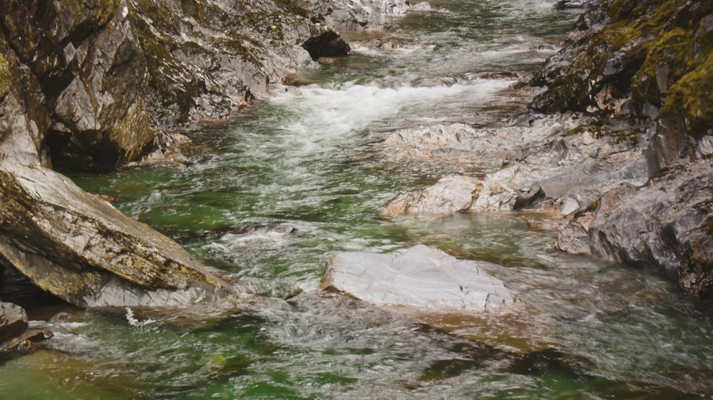 water falls on rocky mountain