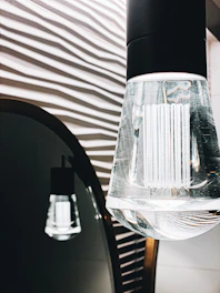 Close-up of a modern frameless LED mirror showcasing smooth, dot-free illumination.