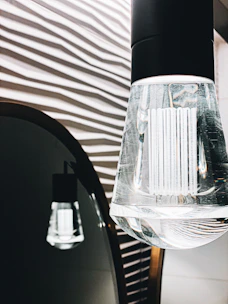 Close-up of a modern frameless LED mirror showcasing smooth, dot-free illumination.