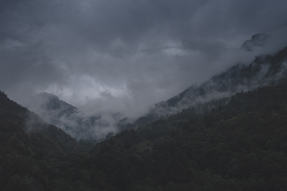 green mountains under white clouds during daytime