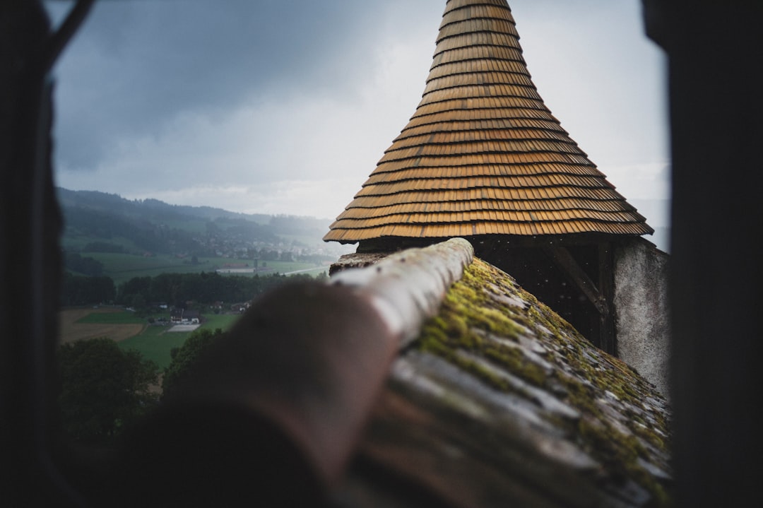 brown roof on top of mountain during daytime