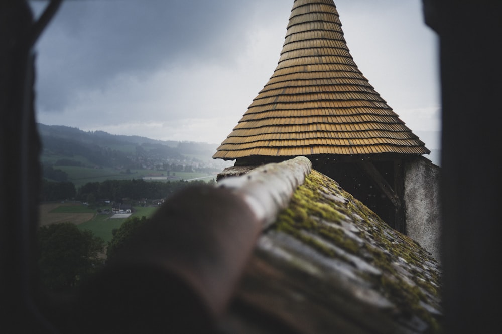 brown roof on top of mountain during daytime