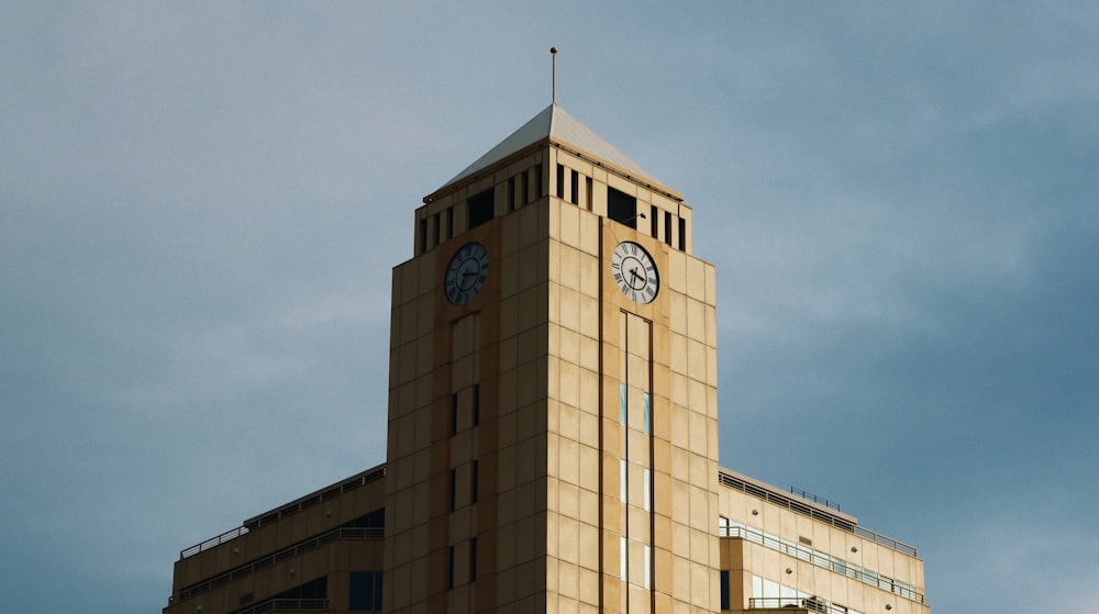 brown concrete building under blue sky during daytime