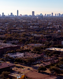 A spacious urban plot with clear boundaries and nearby city skyline.