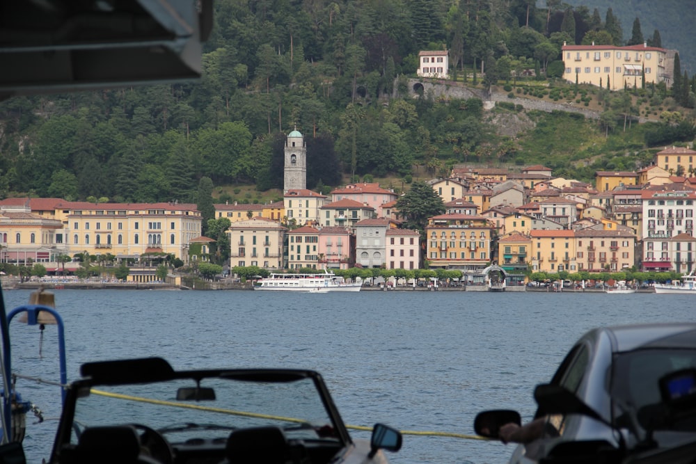 people riding boat on river during daytime