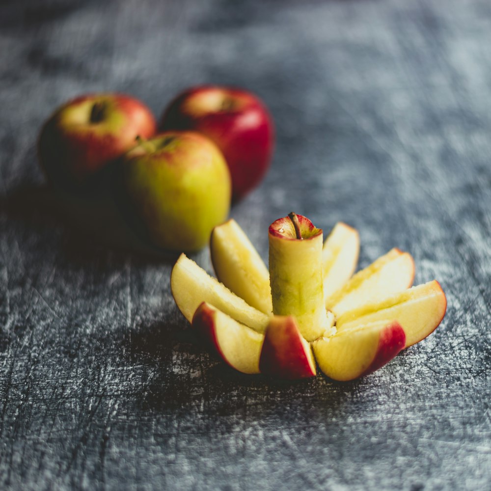 red and green apples on black textile