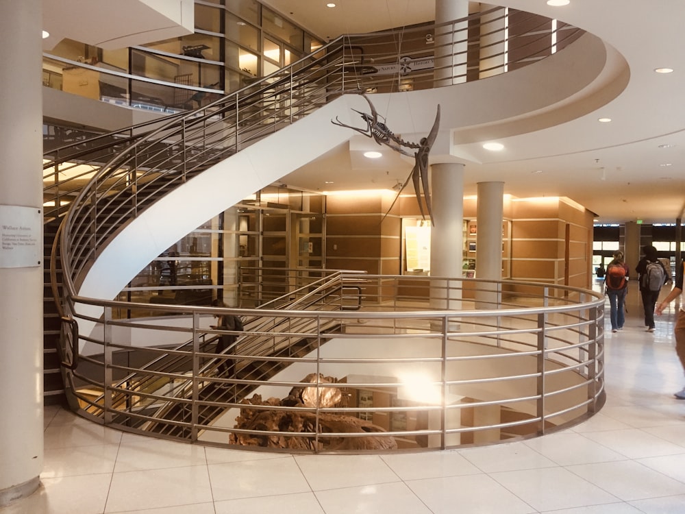 white and brown spiral staircase