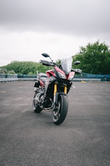 orange and black sports bike on road during daytime