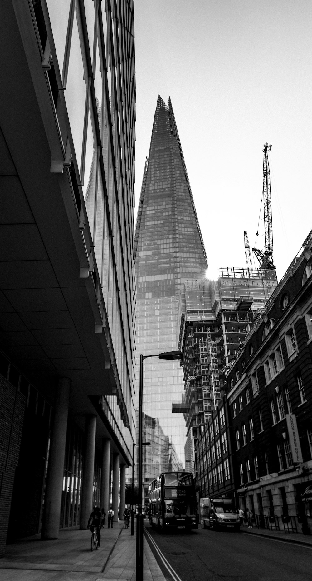 grayscale photo of high rise buildings