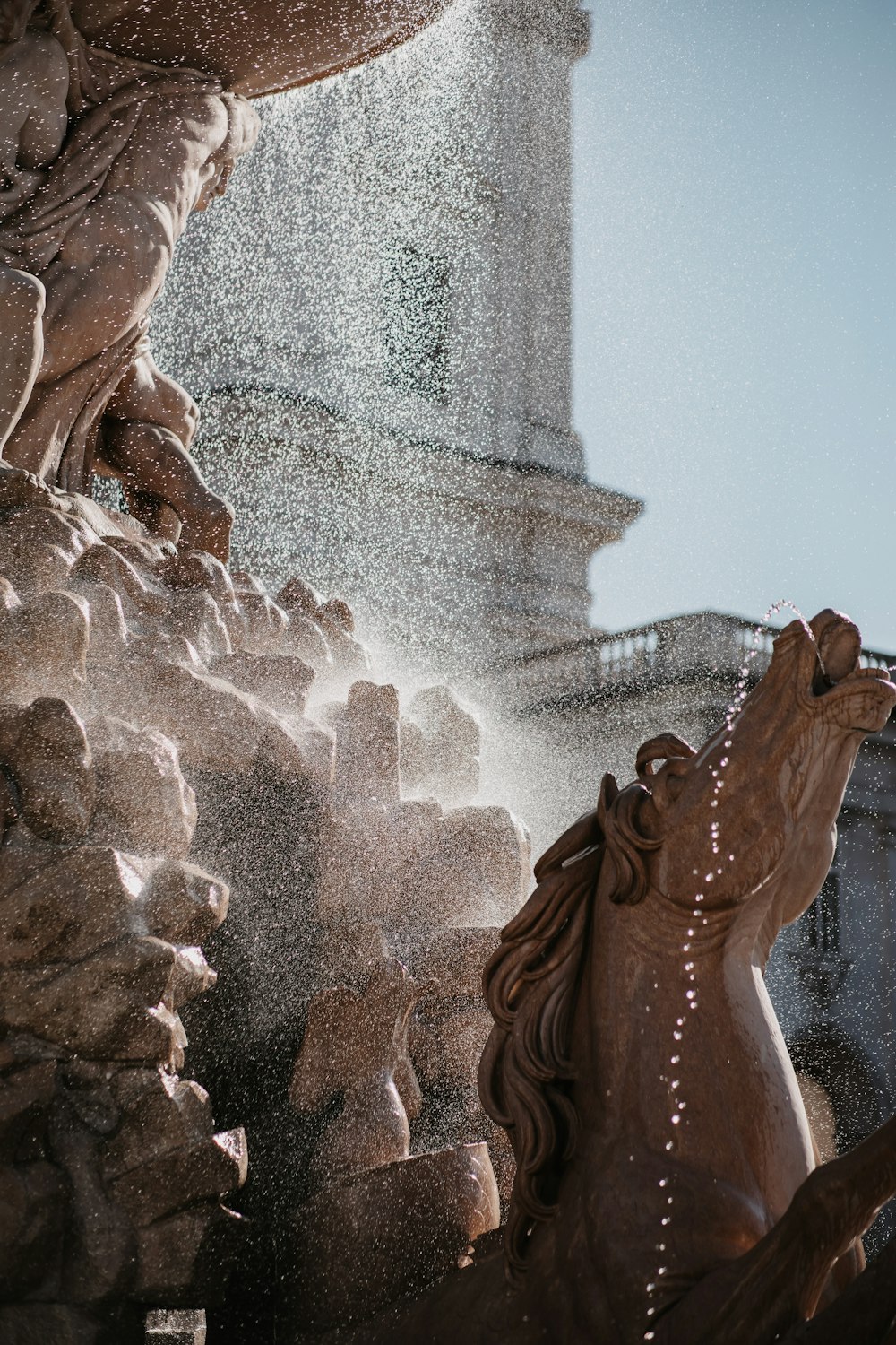 brown and white water fountain