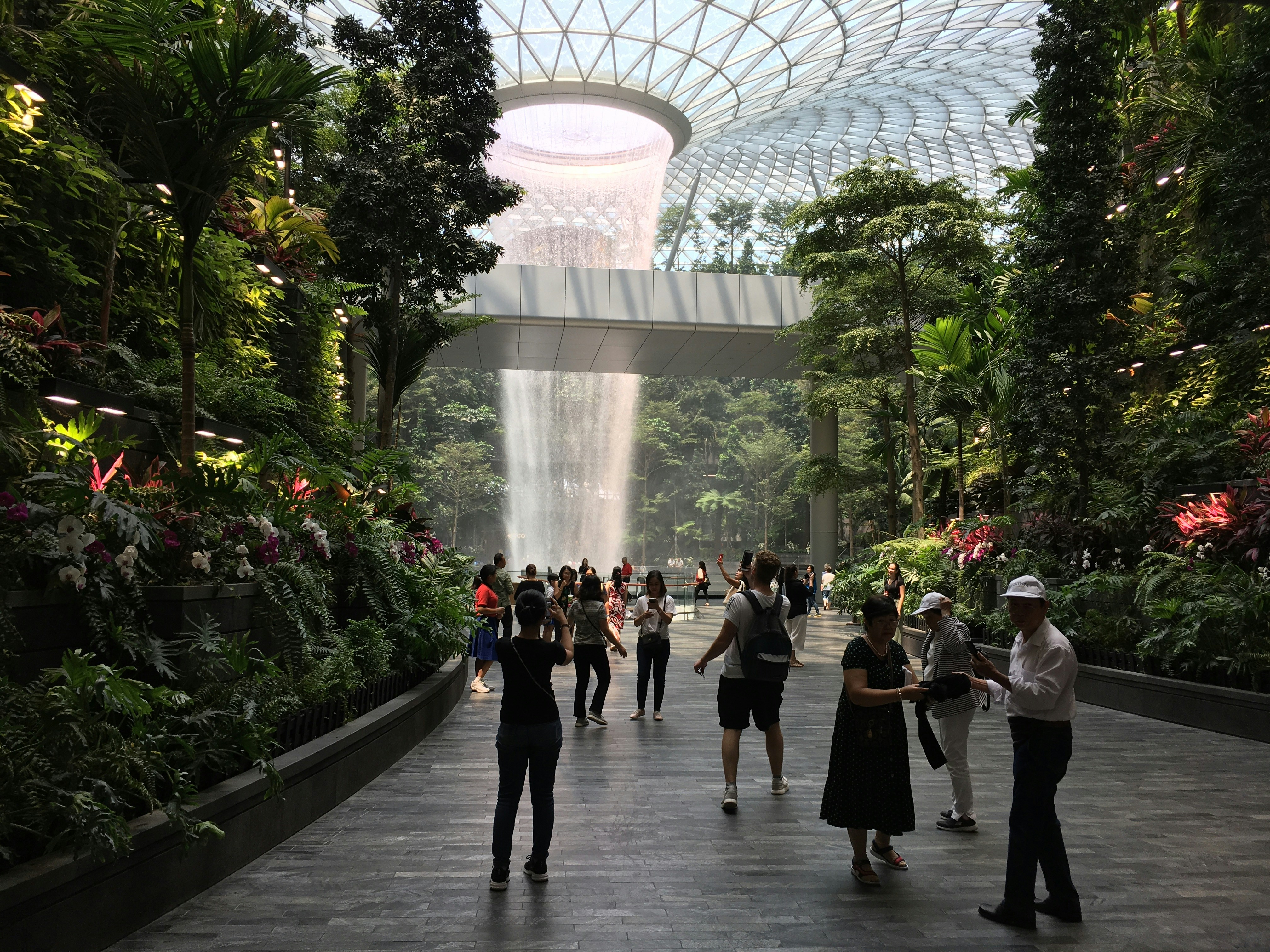people standing on white concrete floor