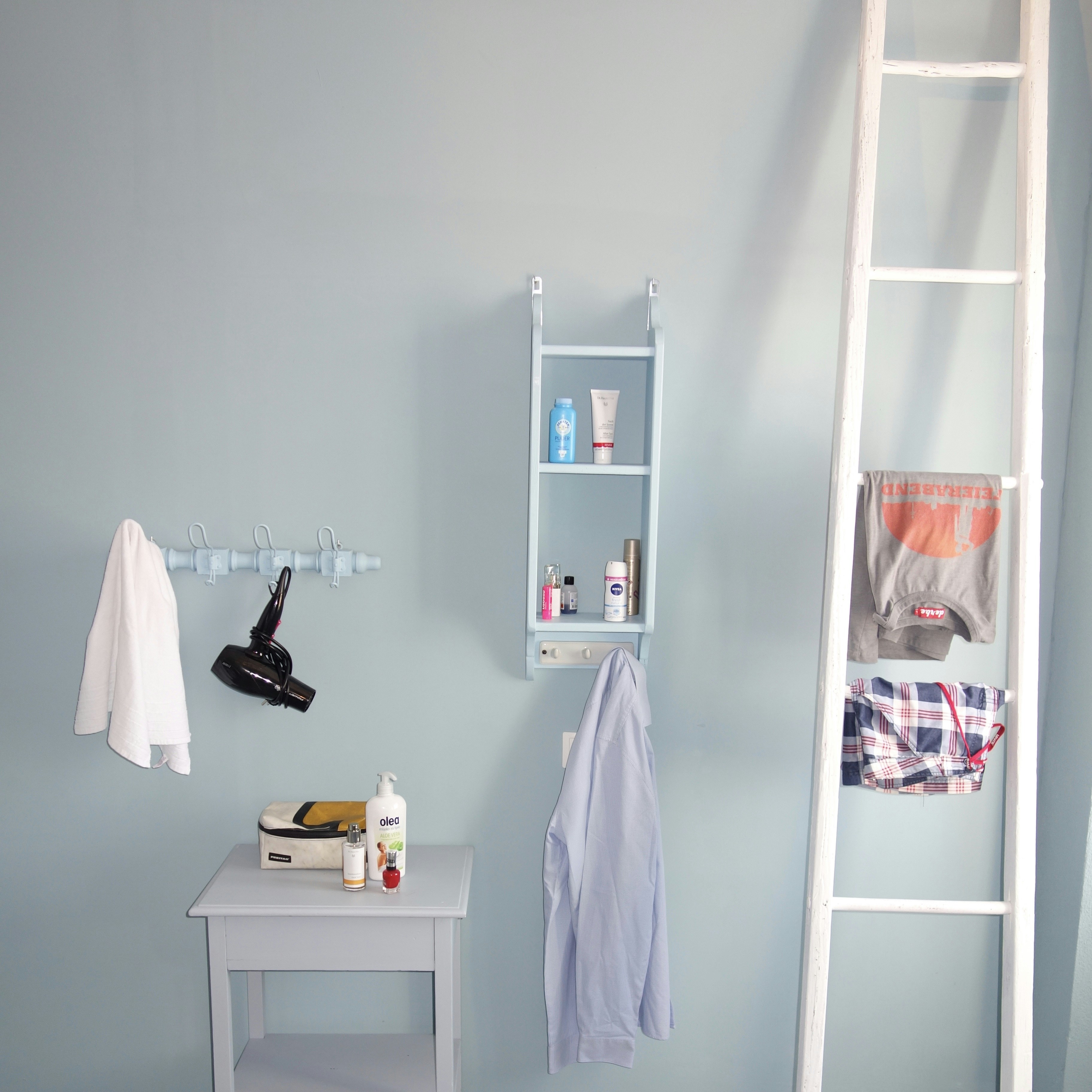 Neatly organized closet with visible, accessible clothing on uniform hangers