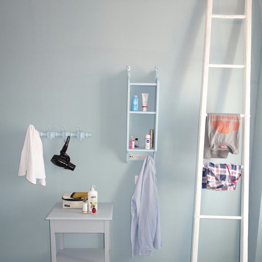 white wooden shelf with assorted items
