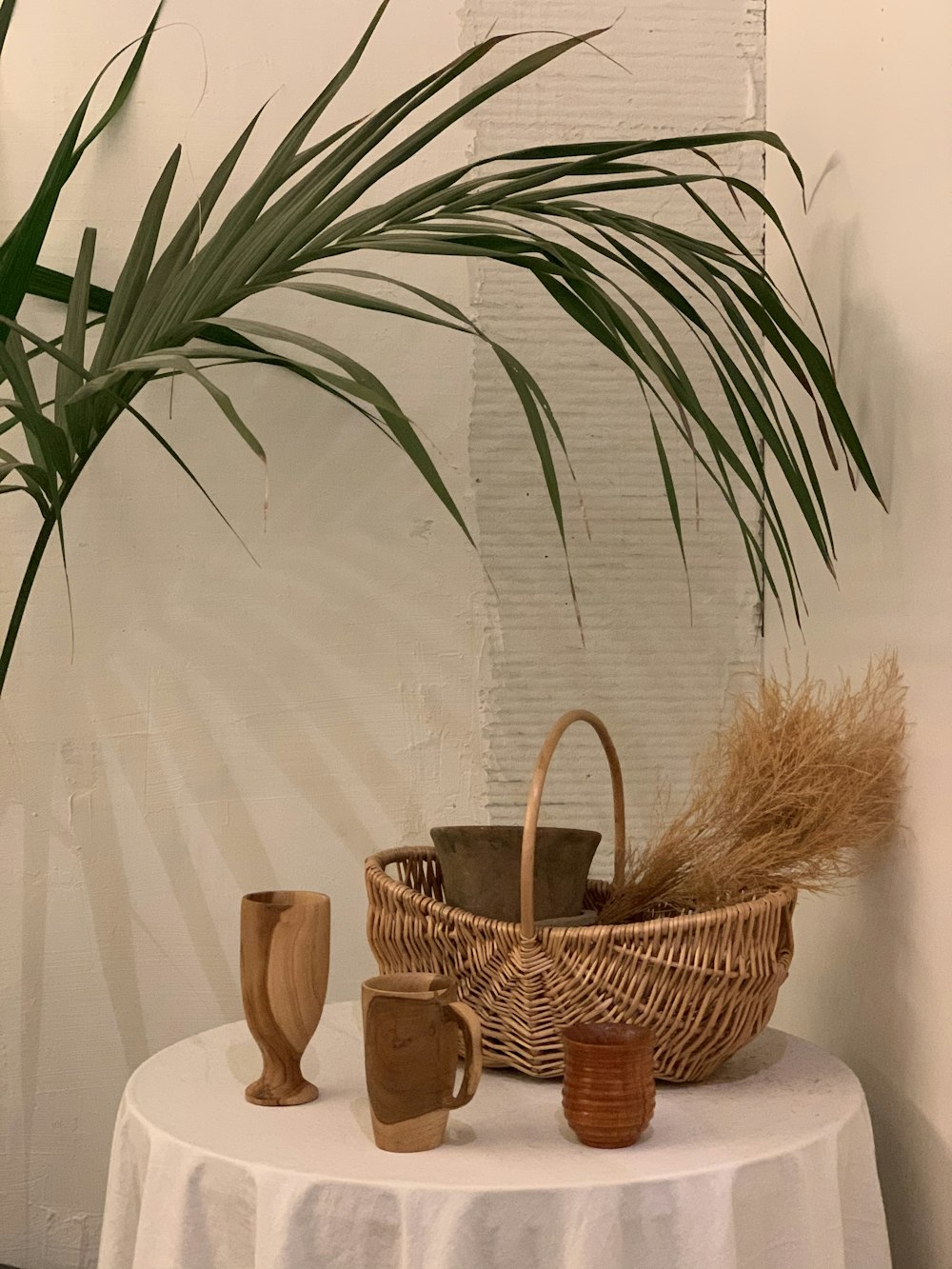 green plant on brown woven basket