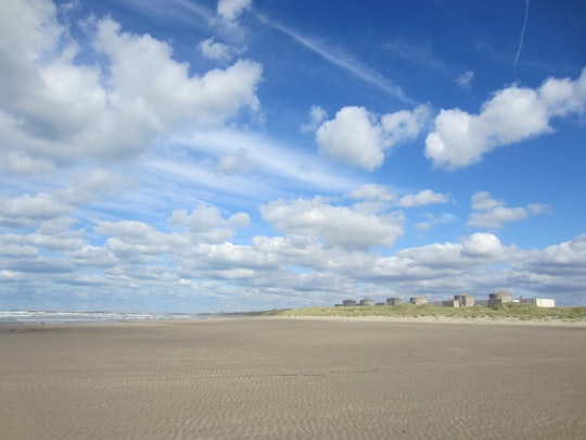 white sand under blue sky and white clouds during daytime in Gravelines France