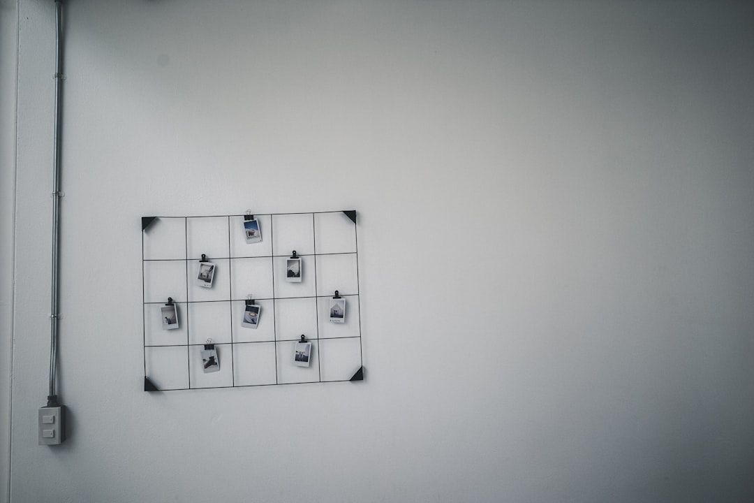 white wall mounted 3 x 3 rubiks cube