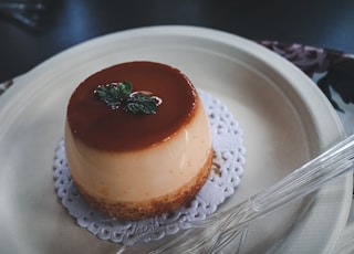 brown cake on white ceramic plate