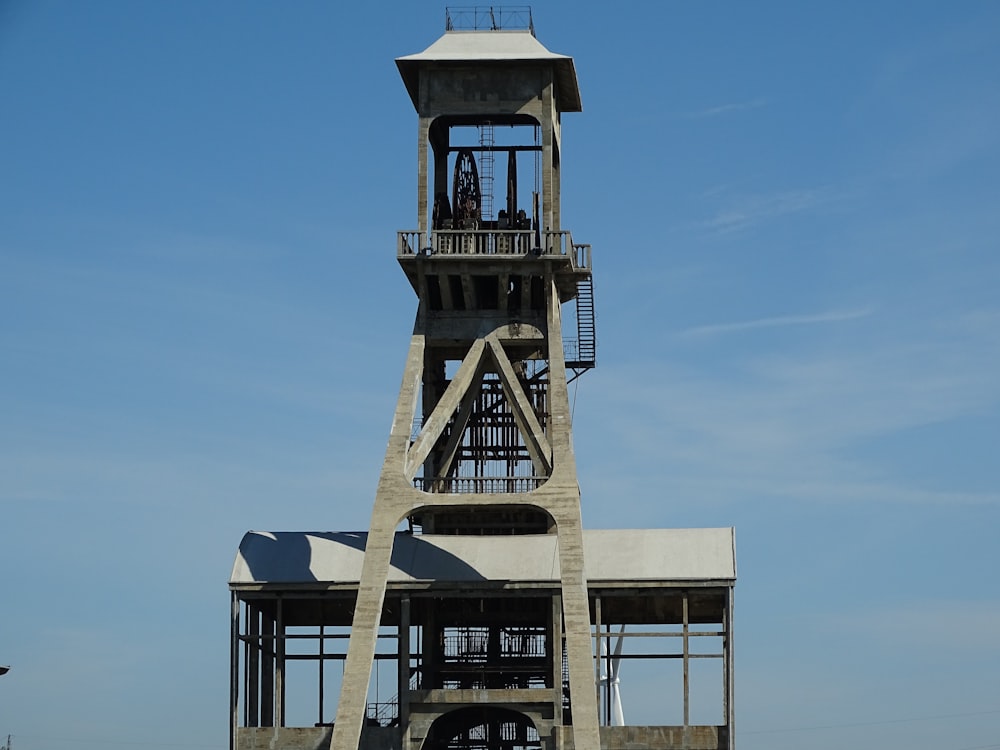 brown and black tower under blue sky during daytime