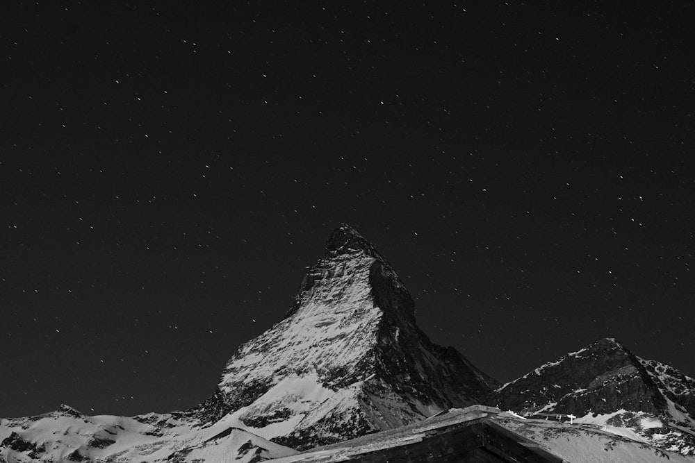 snow covered mountain during daytime