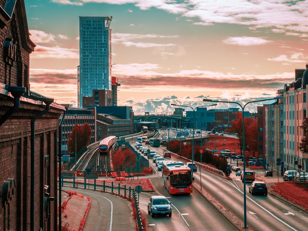 cars on road near buildings during daytime