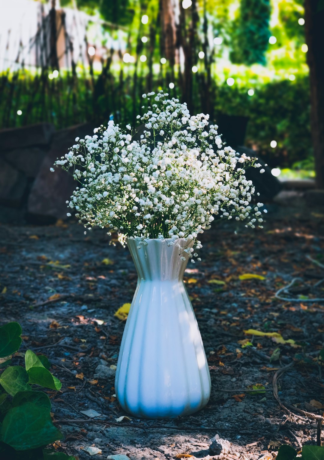 white flower bouquet in glass vase