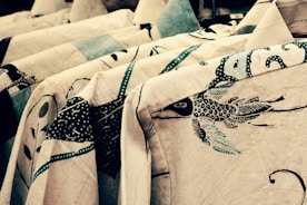 white blue and black floral textile