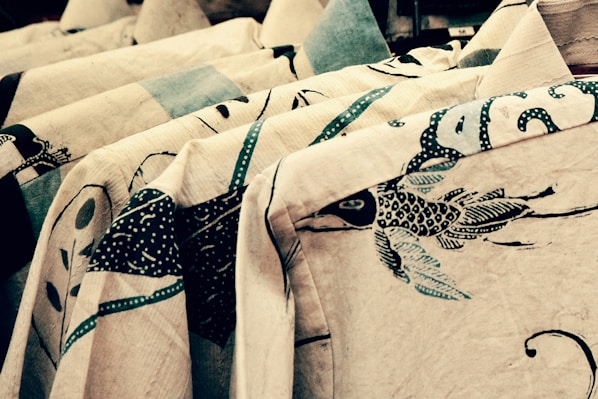 white blue and black floral textile