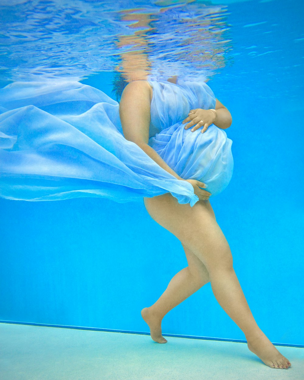 woman in blue and white dress