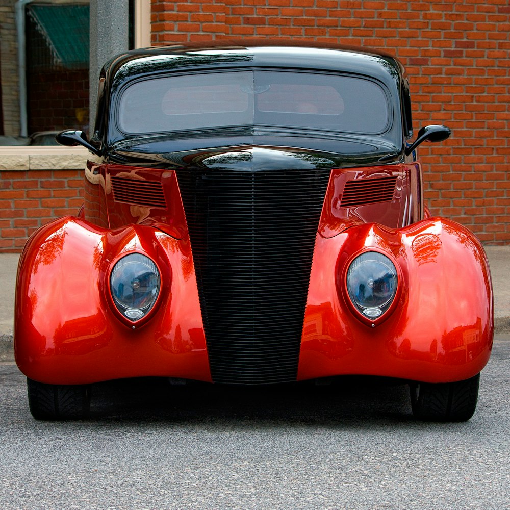 red and black vintage car