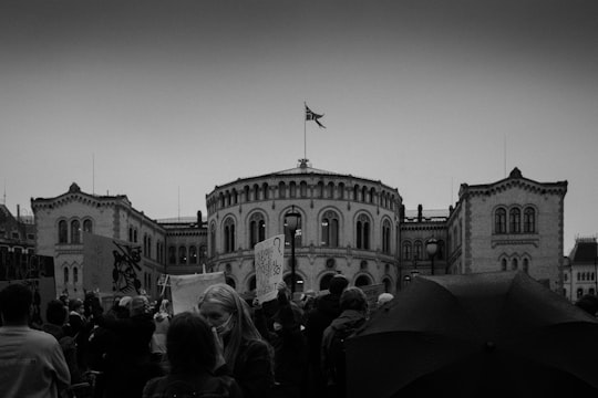 grayscale photo of people walking on street in Oslo Norway