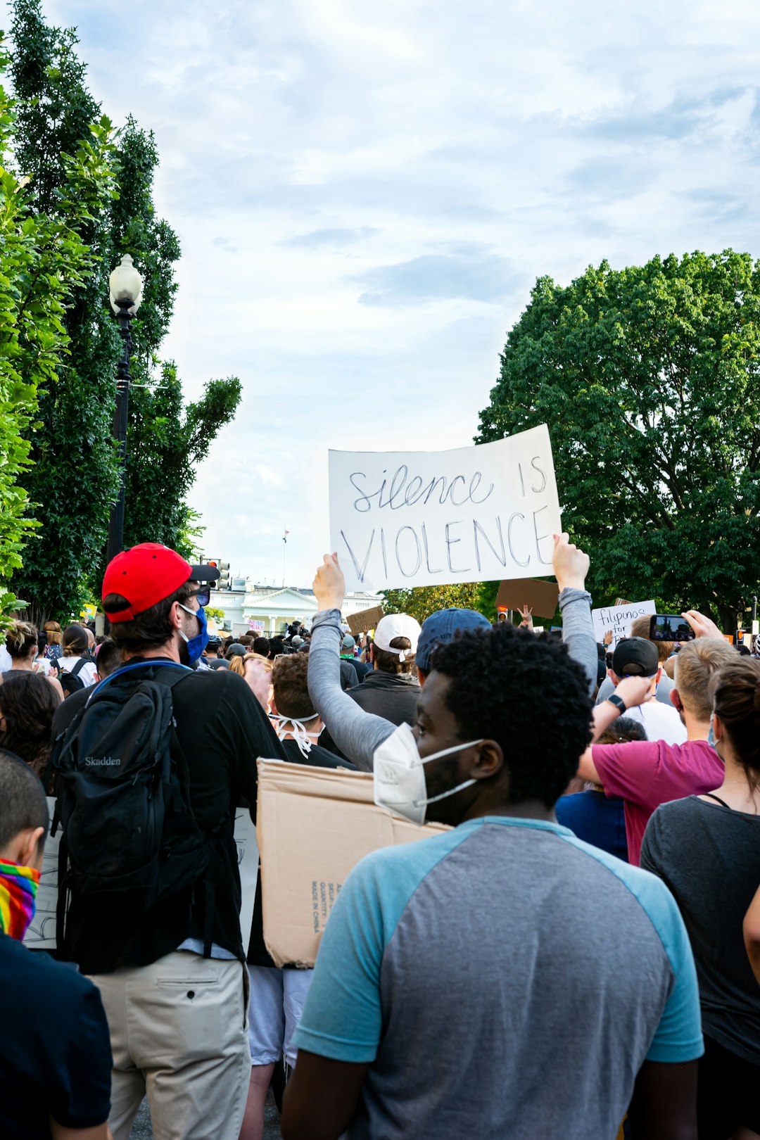 people gathering on park during daytime