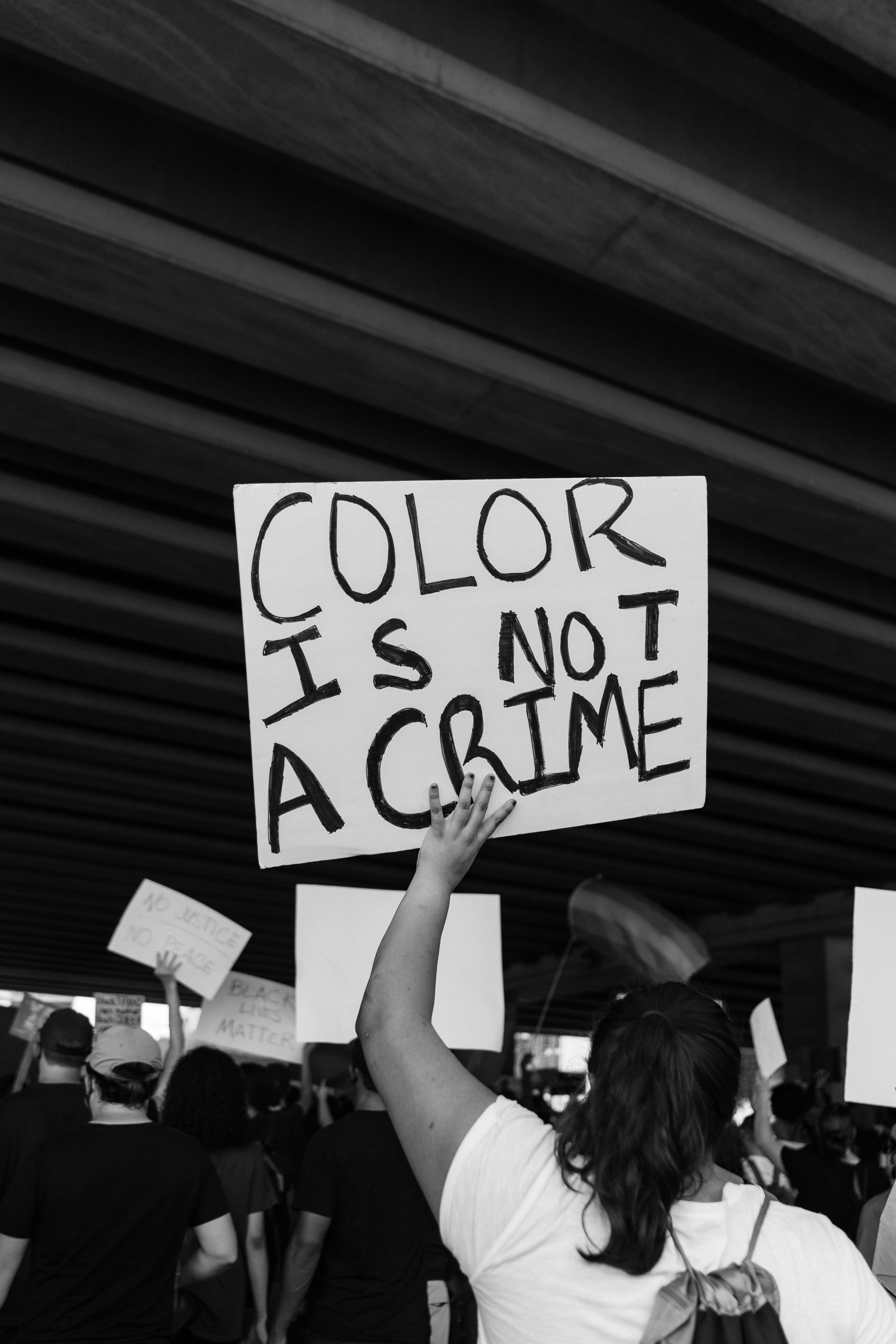Person holding a sign