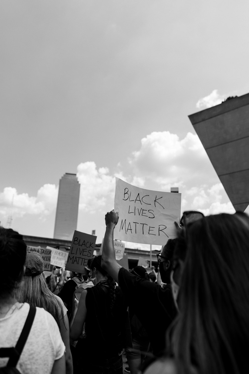 grayscale photo of people walking on street