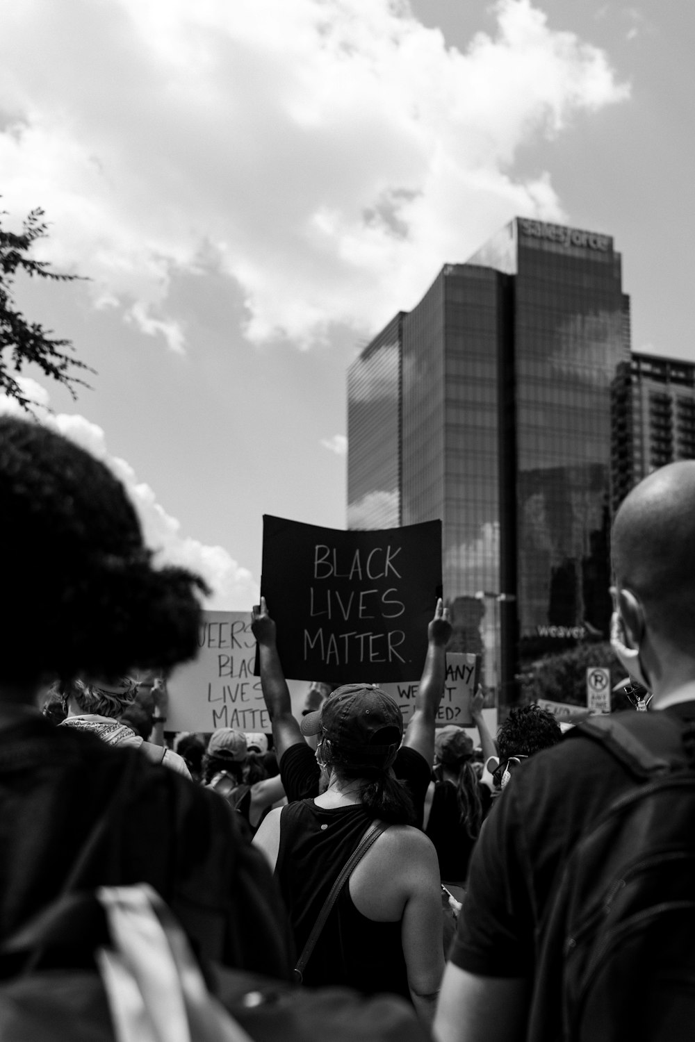 grayscale photo of people walking on street