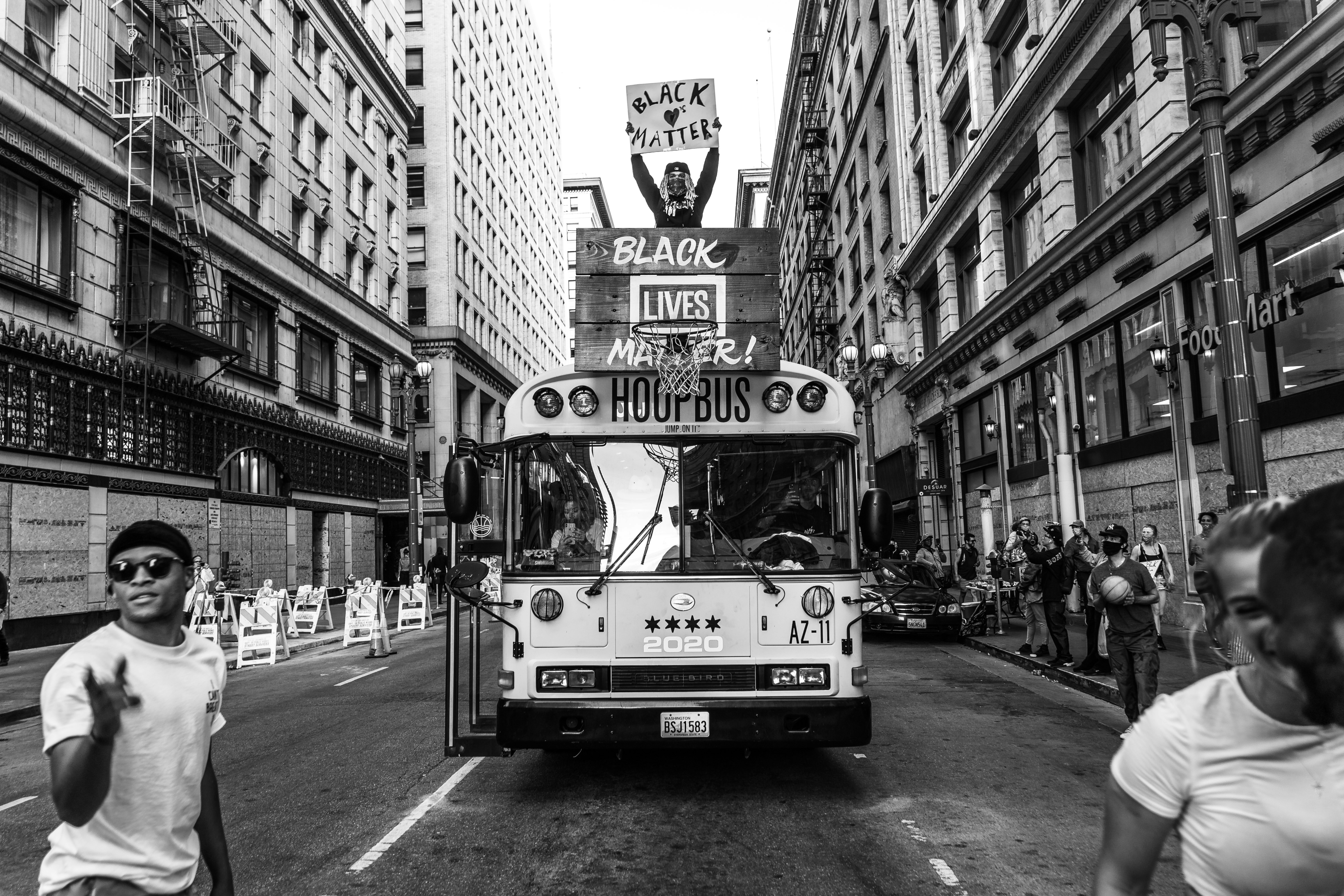 grayscale photo of double decker bus on road