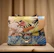 blue and brown floral leather handbag