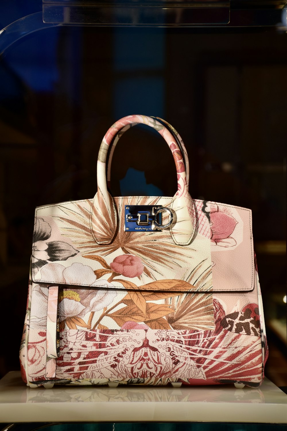 white and red floral handbag