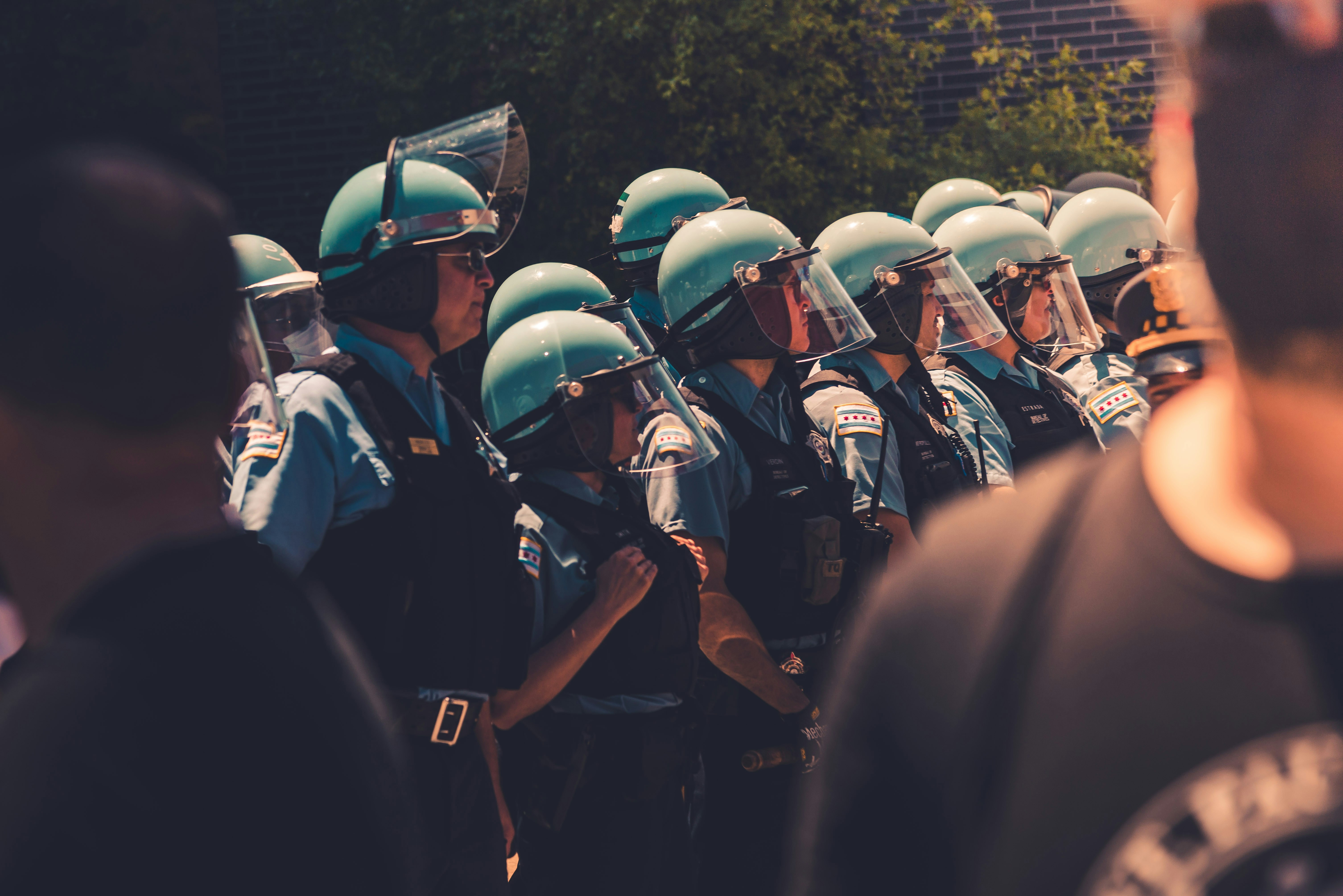 group of men in black and white helmet