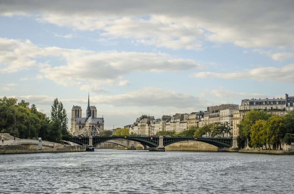 gray concrete bridge over river