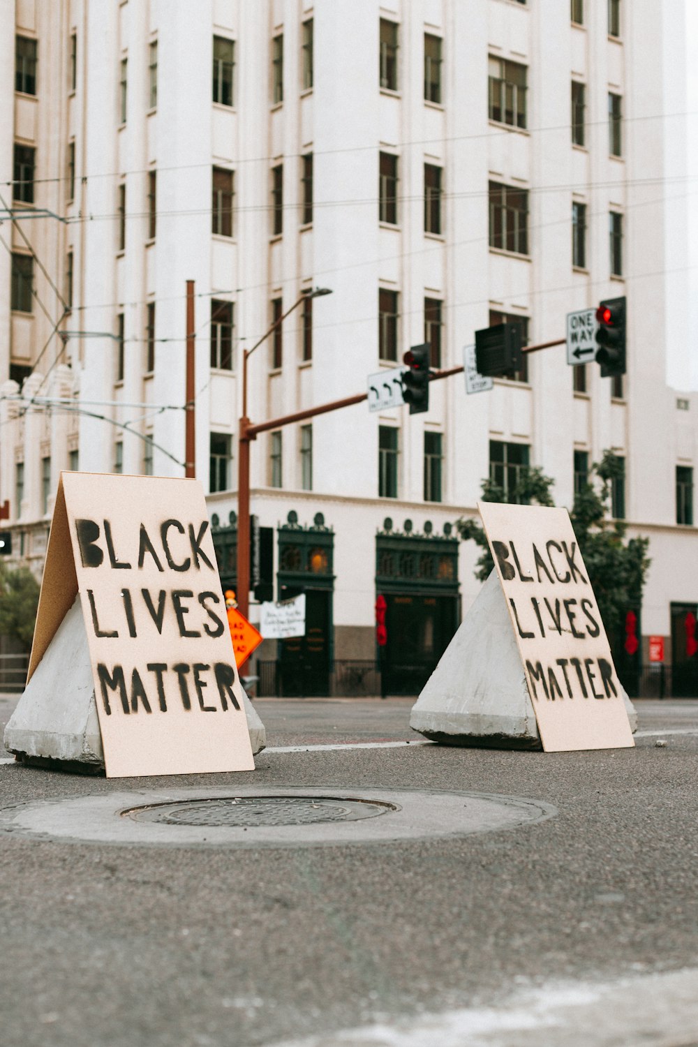 white and black street sign