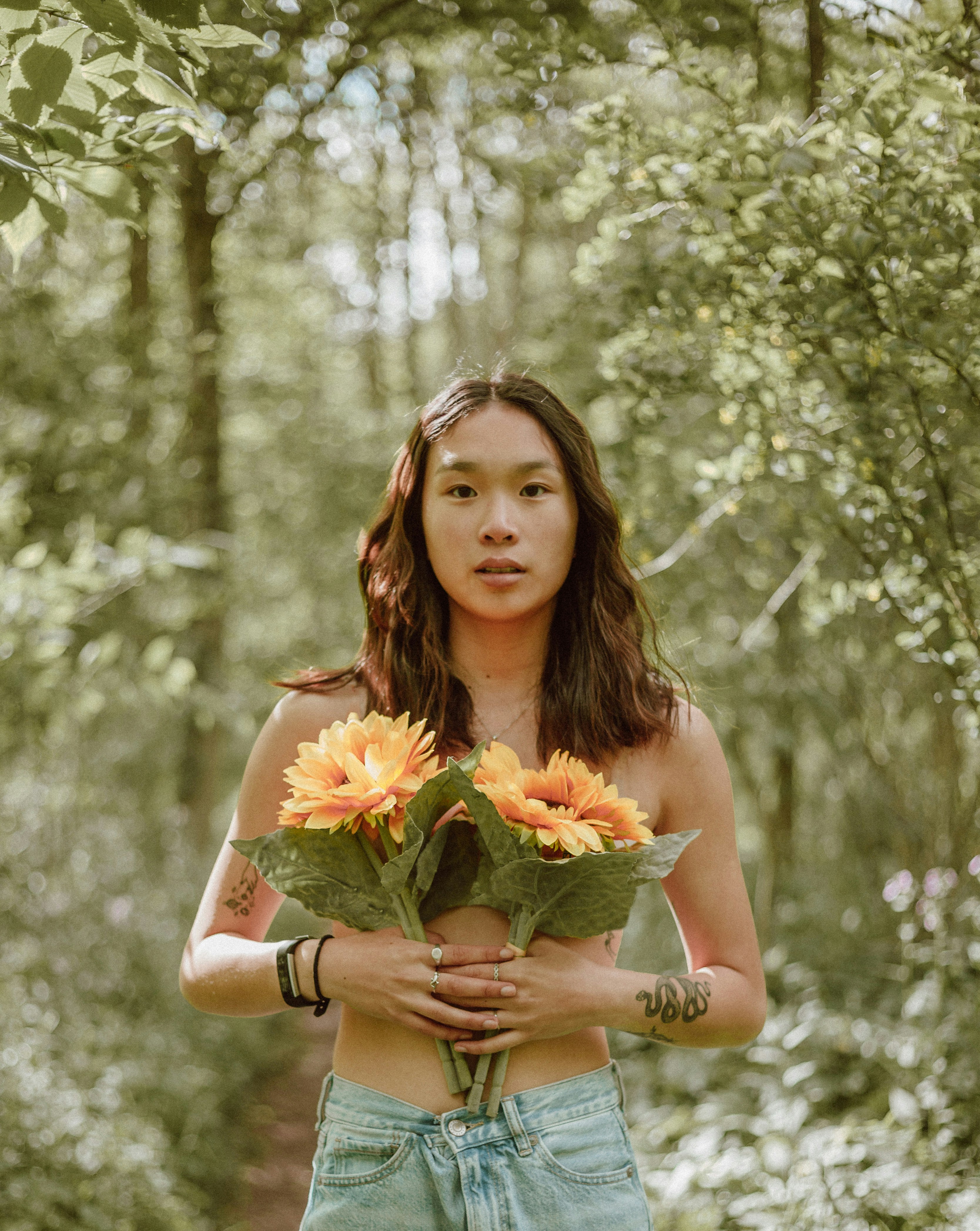 woman holding bouquet of flowers