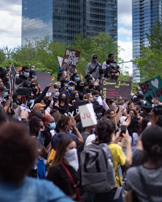 A peaceful protest rally highlighting global health justice.