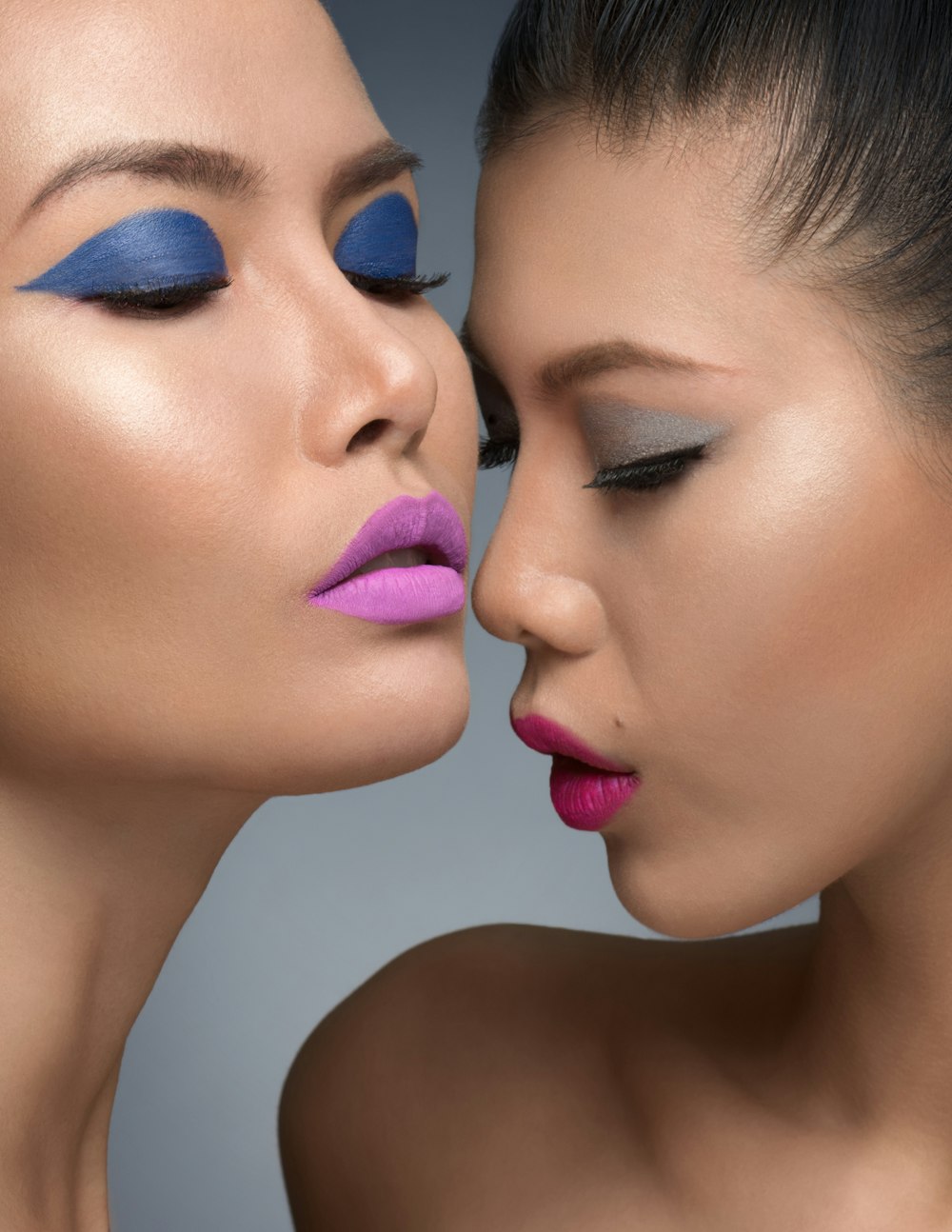 woman with blue eyes and red lipstick