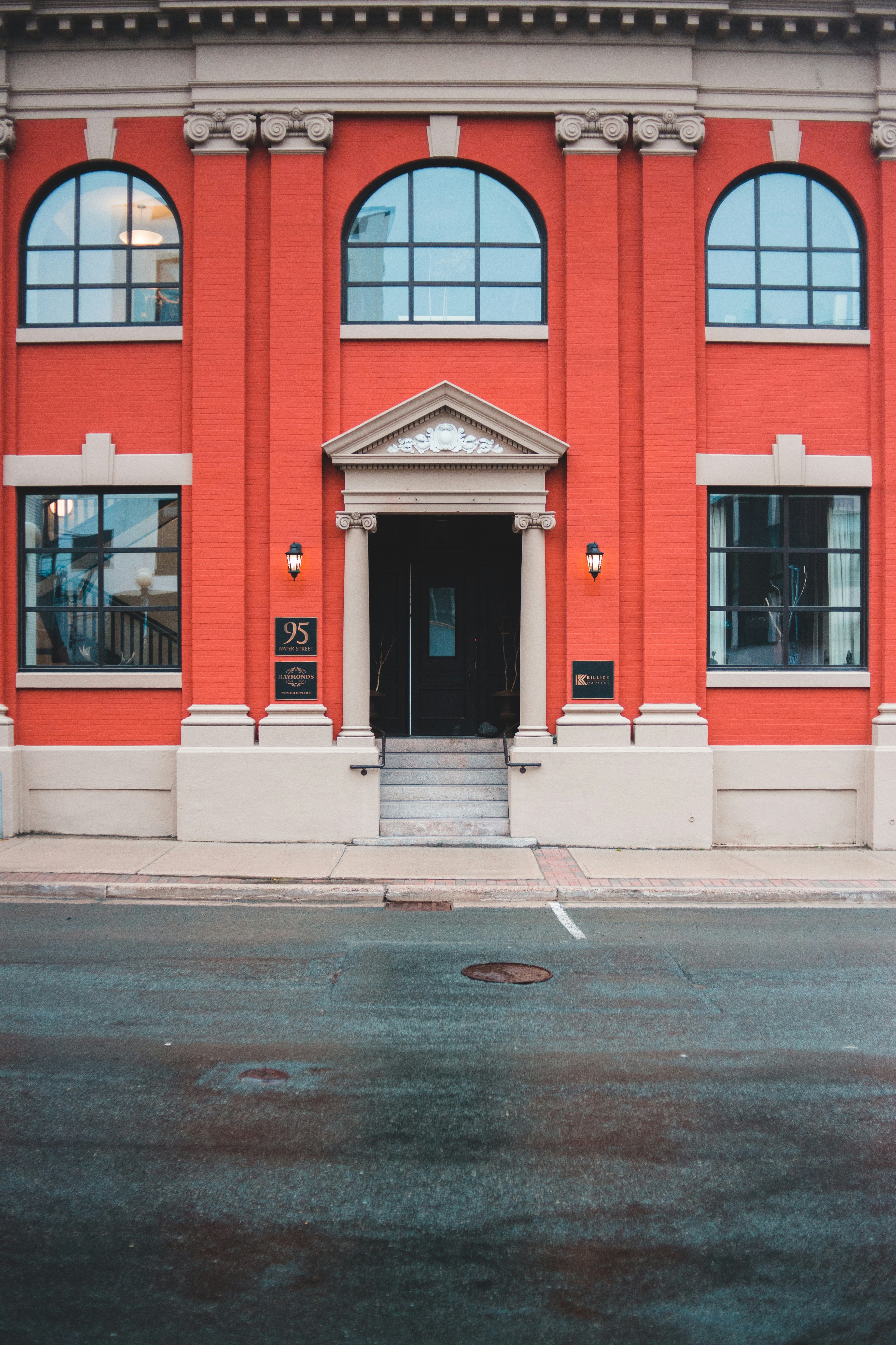 Red and white concrete building photo – Free Tarmac Image on Unsplash
