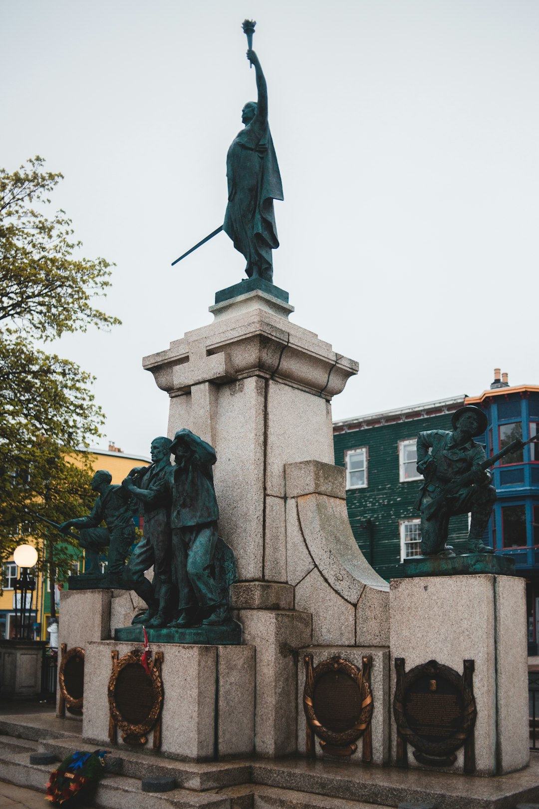 man riding on horse statue