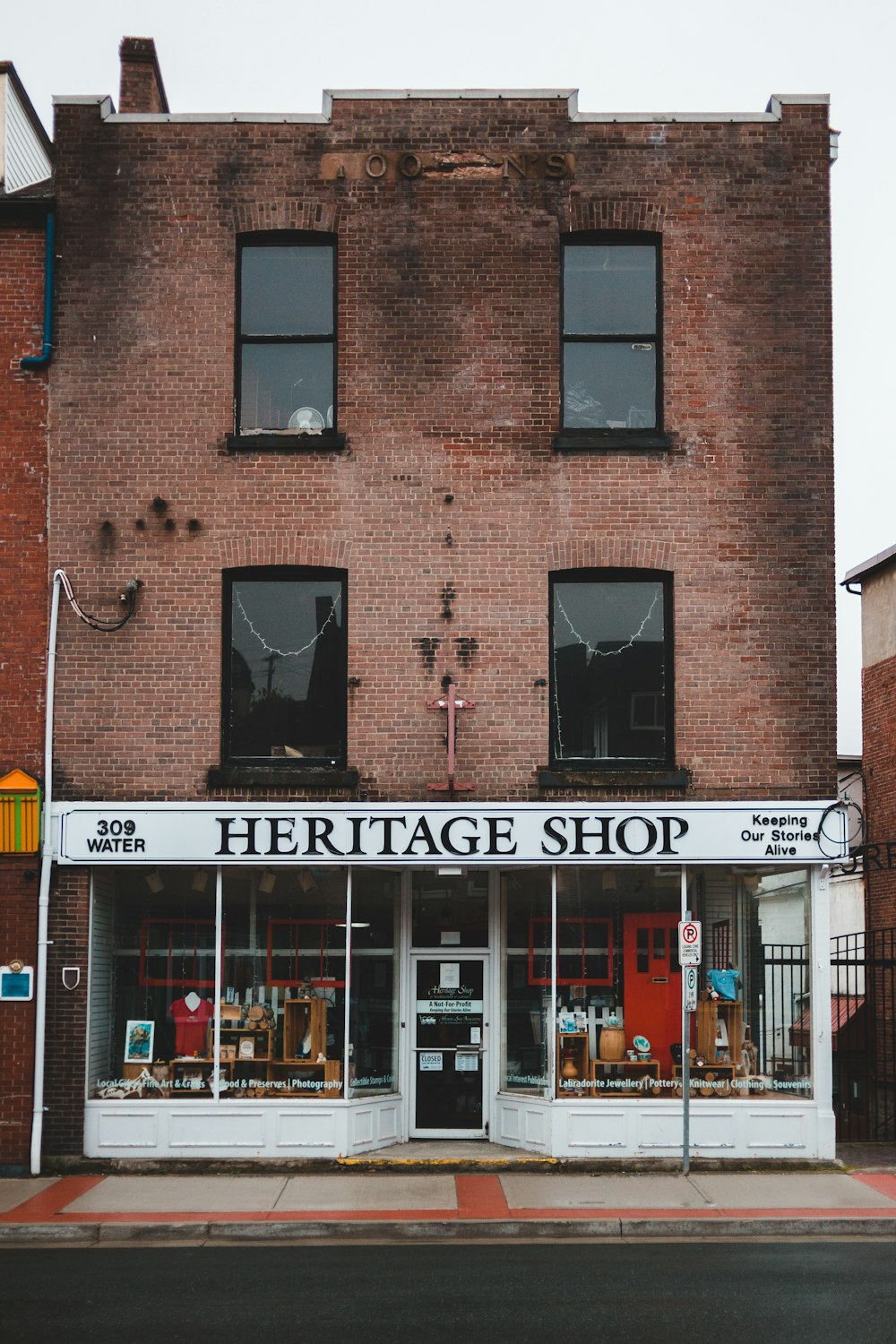 brown brick building with glass windows