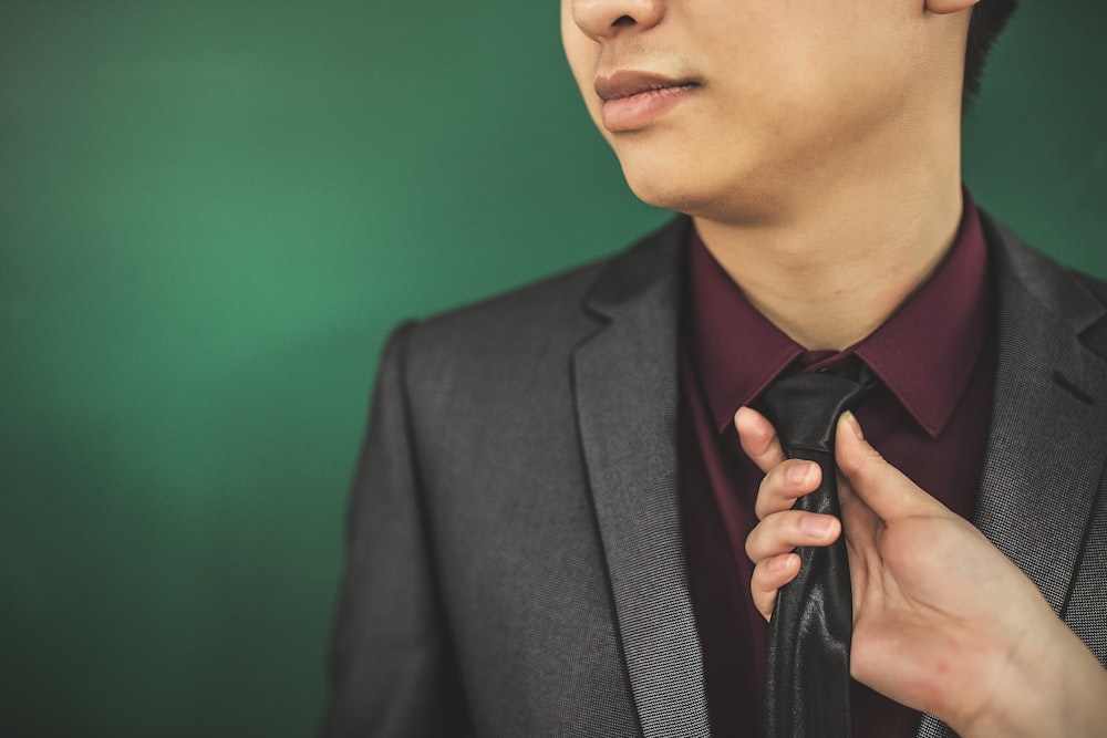 man in black suit jacket